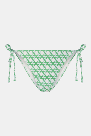 The Roller Rabbit Cane Serena Bikini Bottom in green and white features adjustable side ties for a custom fit and offers medium coverage. Displayed on a plain white background.