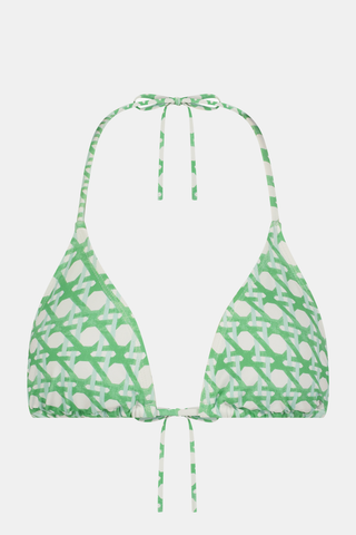The Roller Rabbit Cane Serena Bikini Top features a green and white pattern, halter neck, and back ties. Displayed on a plain white background.