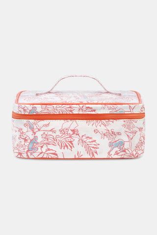 The Charlie Carry All Case by Roller Rabbit is a rectangular toiletry case crafted from water-resistant cotton canvas. It features a handle and zipper and showcases a vibrant red and blue nature and monkey print on a white background, making this stylish coral case both practical and eye-catching.