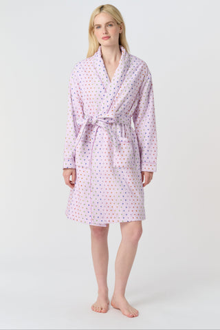 A woman stands barefoot in the Roller Rabbit Disco Hearts Cosmo Robe, featuring a subtle geometric pattern and a matching waist tie, facing forward against a plain white background.
