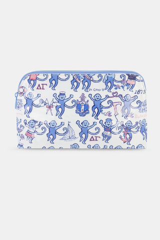 The Delta Gamma Monkey Makeup Bag by Roller Rabbit is a white zippered pouch crafted from cotton canvas, featuring cheerful blue and red monkey illustrations, Greek letters, and playful doodles. Inspired by DG themes, this makeup bag displays whimsical symbols and lively text for a fun, eye-catching pattern on the front.