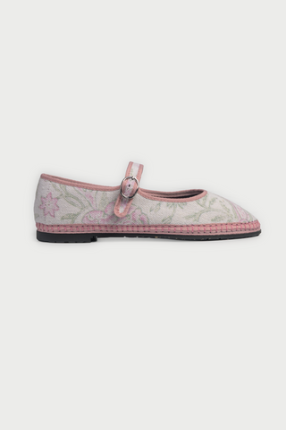 The FLABELUS Camellia Block Mary Jane is a flat linen shoe with a pink floral block print, pink trim, a buckle strap, and black sole, shown against a white background.