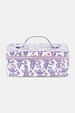 A person dressed in a purple robe adorned with a playful monkey pattern holds the STREET SMART Get Ready With Me Carry All Case—ideal as a makeup organizer or for storing your GRWM essentials—against a plain background.
