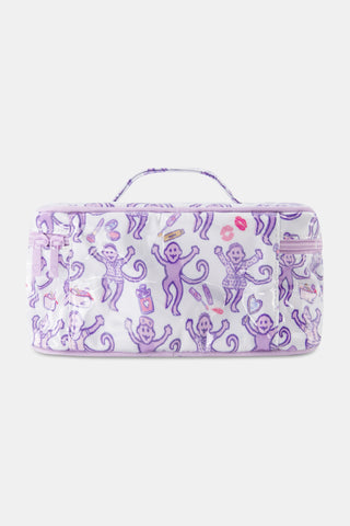 A person dressed in a purple robe adorned with a playful monkey pattern holds the STREET SMART Get Ready With Me Carry All Case—ideal as a makeup organizer or for storing your GRWM essentials—against a plain background.