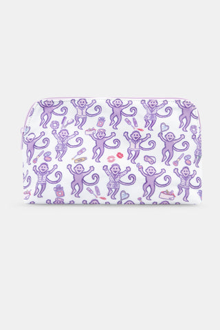 Introducing the STREET SMART Get Ready With Me Makeup Bag, featuring a whimsical white design adorned with playful purple monkeys holding bananas, lipstick, and shoes, surrounded by scattered lips and compact mirrors on a clean background.