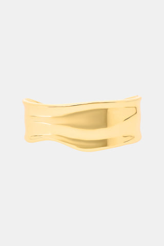 Wavy Cuff Bracelet in wide, gold-tone plated brass with an irregular, wavy edge.