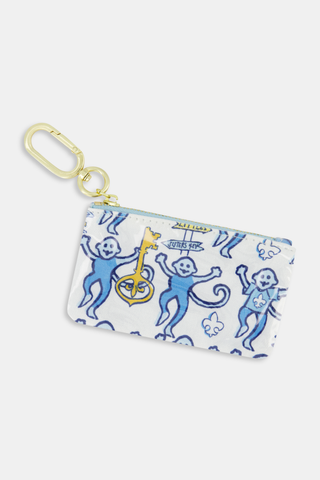 The Kappa Kappa Gamma Monkey Coin Pouch by Roller Rabbit is a small white cotton canvas coin purse featuring gold key designs, playful blue monkey illustrations, a blue zipper, and a gold keychain clip on the top left corner—making it perfect as a Kappa-themed accessory or bid day gift.