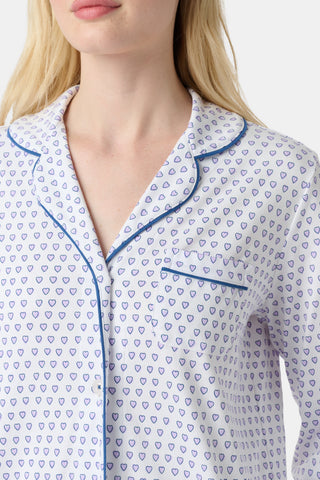 Pattern of small, evenly spaced blue and purple outline hearts on white with soft shadows—perfect for women’s Hearts Long Sleeve Polo Pajamas or a cozy lavender heart print pajama set.