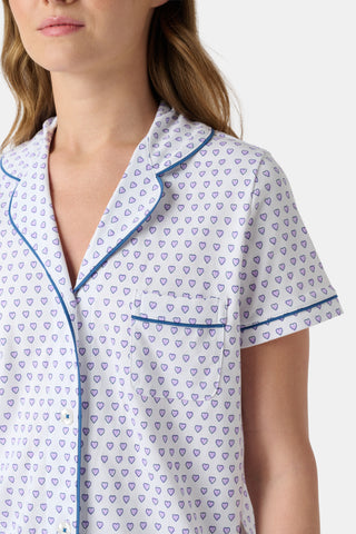 Pattern of small, evenly spaced blue and purple outline hearts on white with soft shadows—perfect for women’s Hearts Long Sleeve Polo Pajamas or a cozy lavender heart print pajama set.