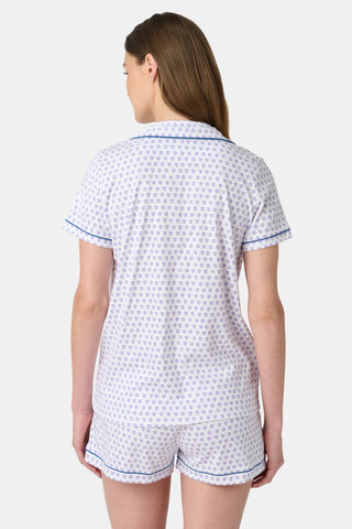 Pattern of small, evenly spaced blue and purple outline hearts on white with soft shadows—perfect for women’s Hearts Long Sleeve Polo Pajamas or a cozy lavender heart print pajama set.