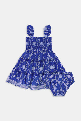 The Roller Rabbit Kids Lobster Trellis Ceri Dress features blue fabric with a white lobster and seaweed pattern, giving it a nautical vibe. The slightly wrinkled texture adds charm to this playful cotton summer dress.