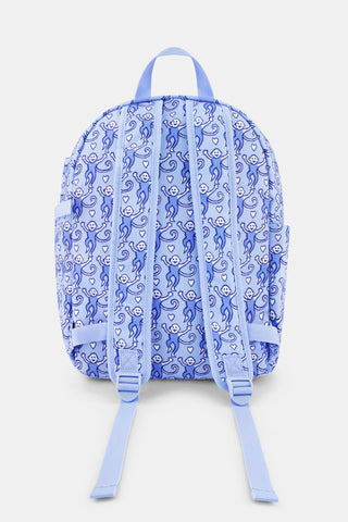 The Roller Rabbit Lovely Monkey Backpack for kids features a playful pattern of monkeys in various poses, a front pocket, and pink zippers set against a light background.
