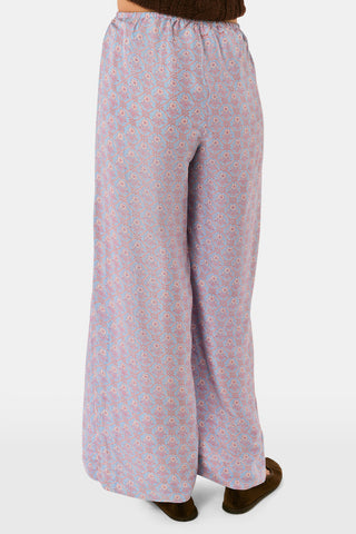SAPPHIRE Mia Floral Paige Pant ice blue wide-leg lounge pants in silk dupioni featuring a repeating floral and geometric pattern and an elasticized drawstring waist.