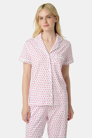 The Hearts Mischa Set is made from white Pima cotton with small, outlined pink hearts and a softly wrinkled texture, creating gentle shadows—perfect for cozy loungewear.