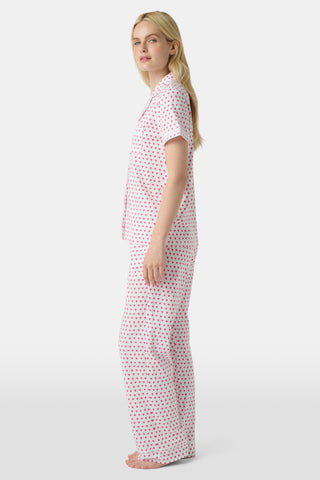 The Hearts Mischa Set is made from white Pima cotton with small, outlined pink hearts and a softly wrinkled texture, creating gentle shadows—perfect for cozy loungewear.