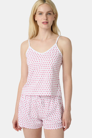 The Hearts Mischa Set is made from white Pima cotton with small, outlined pink hearts and a softly wrinkled texture, creating gentle shadows—perfect for cozy loungewear.