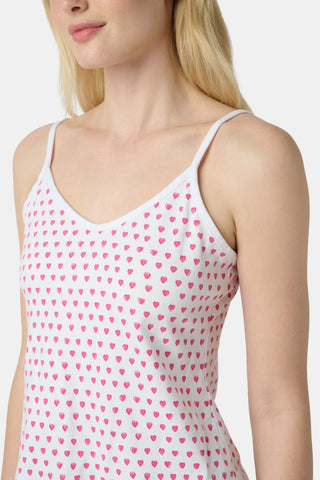 The Hearts Mischa Set is made from white Pima cotton with small, outlined pink hearts and a softly wrinkled texture, creating gentle shadows—perfect for cozy loungewear.