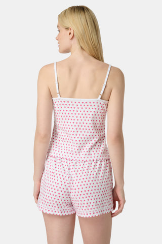 The Hearts Mischa Set is made from white Pima cotton with small, outlined pink hearts and a softly wrinkled texture, creating gentle shadows—perfect for cozy loungewear.