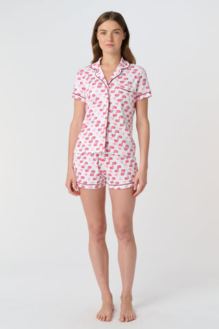 The Moby Polo Pajamas feature a playful pink whale and palm tree pattern on soft Pima cotton, making these women’s short sleeve pajamas a charming choice for fans of tropical whale print sleepwear.