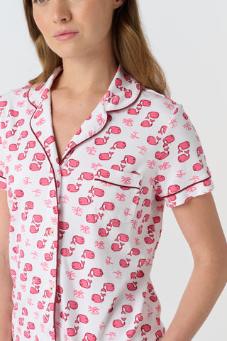 The Moby Polo Pajamas feature a playful pink whale and palm tree pattern on soft Pima cotton, making these women’s short sleeve pajamas a charming choice for fans of tropical whale print sleepwear.