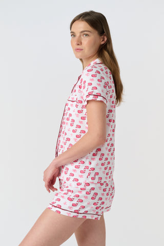 The Moby Polo Pajamas feature a playful pink whale and palm tree pattern on soft Pima cotton, making these women’s short sleeve pajamas a charming choice for fans of tropical whale print sleepwear.
