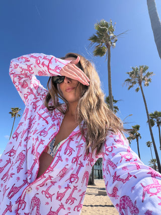 Woman in Gigi the Giraffe Pajamas