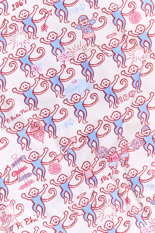 The Roller Rabbit Pi Beta Phi Monkey Pajamas are a long-sleeve set featuring a Henley top and pants, both adorned with a repeating red and blue monkey print on a white background. Made from soft Pima cotton, these pajamas are lightweight and comfortable.