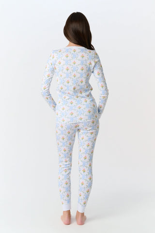 The Roller Rabbit Infant Floral Monkey Trellis Zipper Footie is a long-sleeved, footed onesie made from soft Pima cotton with a blue monkey floral trellis pattern and front diagonal zipper closure.