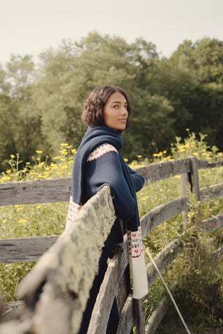 INKASIGN Fairisle Hearts Scarf in dark blue with a cream-colored border, crafted from cotton yarn and made in Peru.