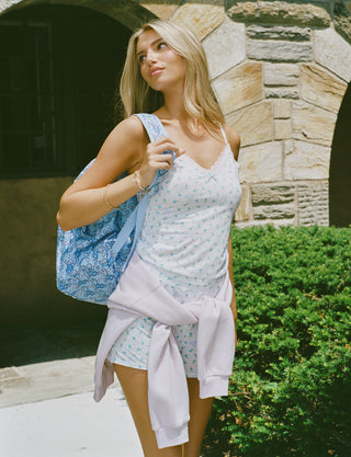 Mini Monkey Blossom Perry Cami by Roller Rabbit, featuring a blue floral print with delicate lace trim at the neckline and thin adjustable shoulder straps, crafted from a soft cotton-modal blend, displayed on a plain light background.