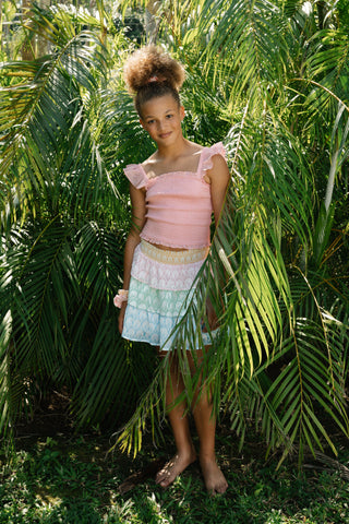 roller rabbit girl in matching top and skirt.
