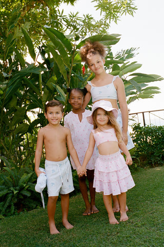 Roller Rabbit spring swim. Kids playing in new seersucker in yard.