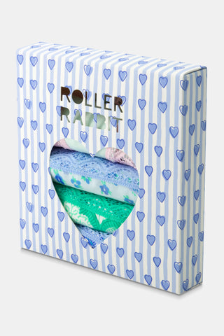 Packaged roller rabbit with blue heart pattern on a white background