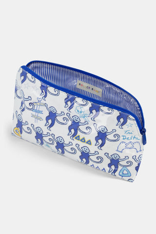 The Roller Rabbit Tri Delta Monkey Makeup Bag is a white zip pouch crafted from cotton canvas and finished with a protective, easy-to-clean coating. It features blue cartoon monkeys—some holding flags or signs—alongside “Tri Delta 1888” text in blue, all arranged in a playful repeating pattern across the bag.