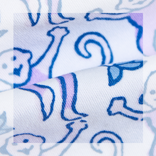 Close-up of fabric with blue floral pattern on a white background
