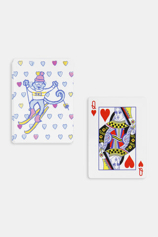 Two Ski Monkey Playing Cards: one showing a cartoon ski monkey surrounded by heart icons, and one showing a traditional Queen of Hearts.